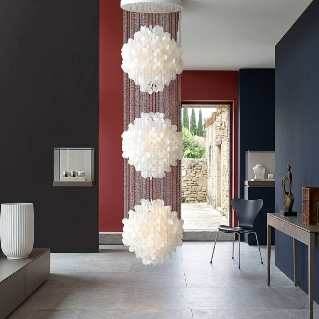 Coralia 3DM FUN tall style staircase shell chandelier two story staircase 9 5 feet tall spiral mansion oceanfront grand entrance vertical statement Mid Century designer warm glow lifestyle interior
