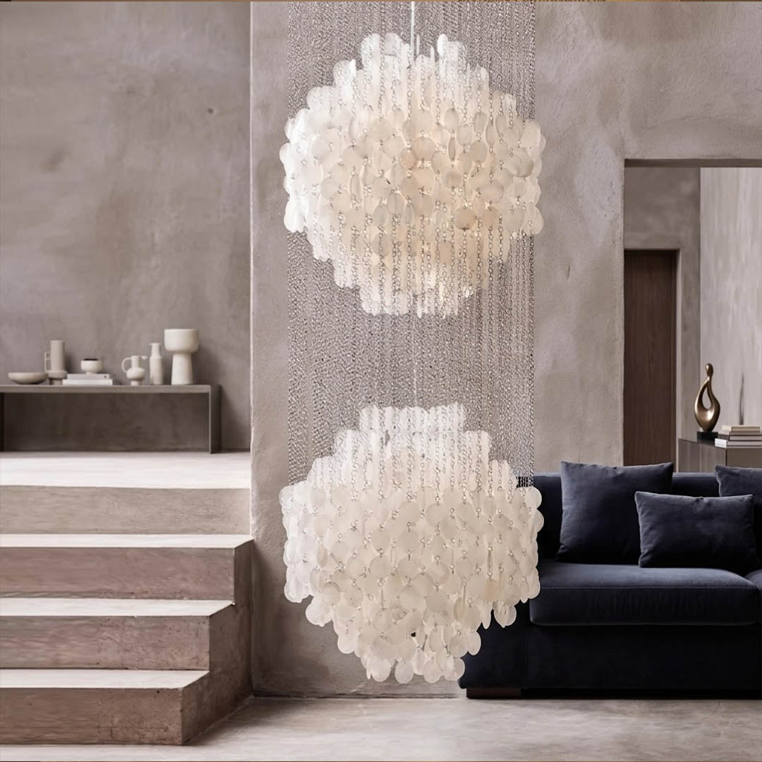 Coralia 5DM FUN tall style staircase shell chandelier two story foyer staircase junction coastal mansion oceanfront Mid Century designer warm glow lifestyle interior