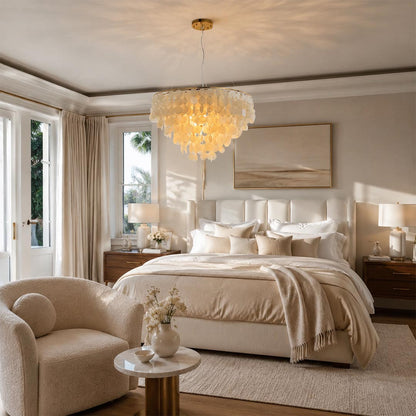 Natural seashell pendant lighting from the Coraline capiz shell wind chime chandelier in a peaceful bedroom