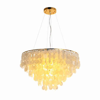 Coraline capiz shell wind chime chandelier illuminated with golden warm light on a plain white background