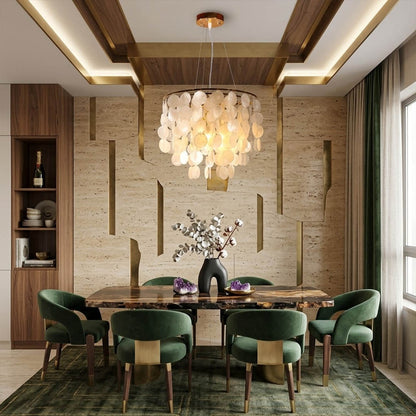 Coraline Capiz shell wind chime chandelier beach house dining room Coastal Hampton white wood interior warm glow natural lifestyle