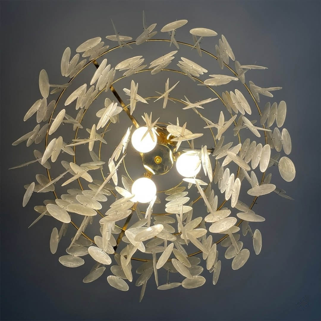 Coraline illuminated Capiz shells warm 2700K glow evening atmosphere translucent pearl Coastal Boho detail close up