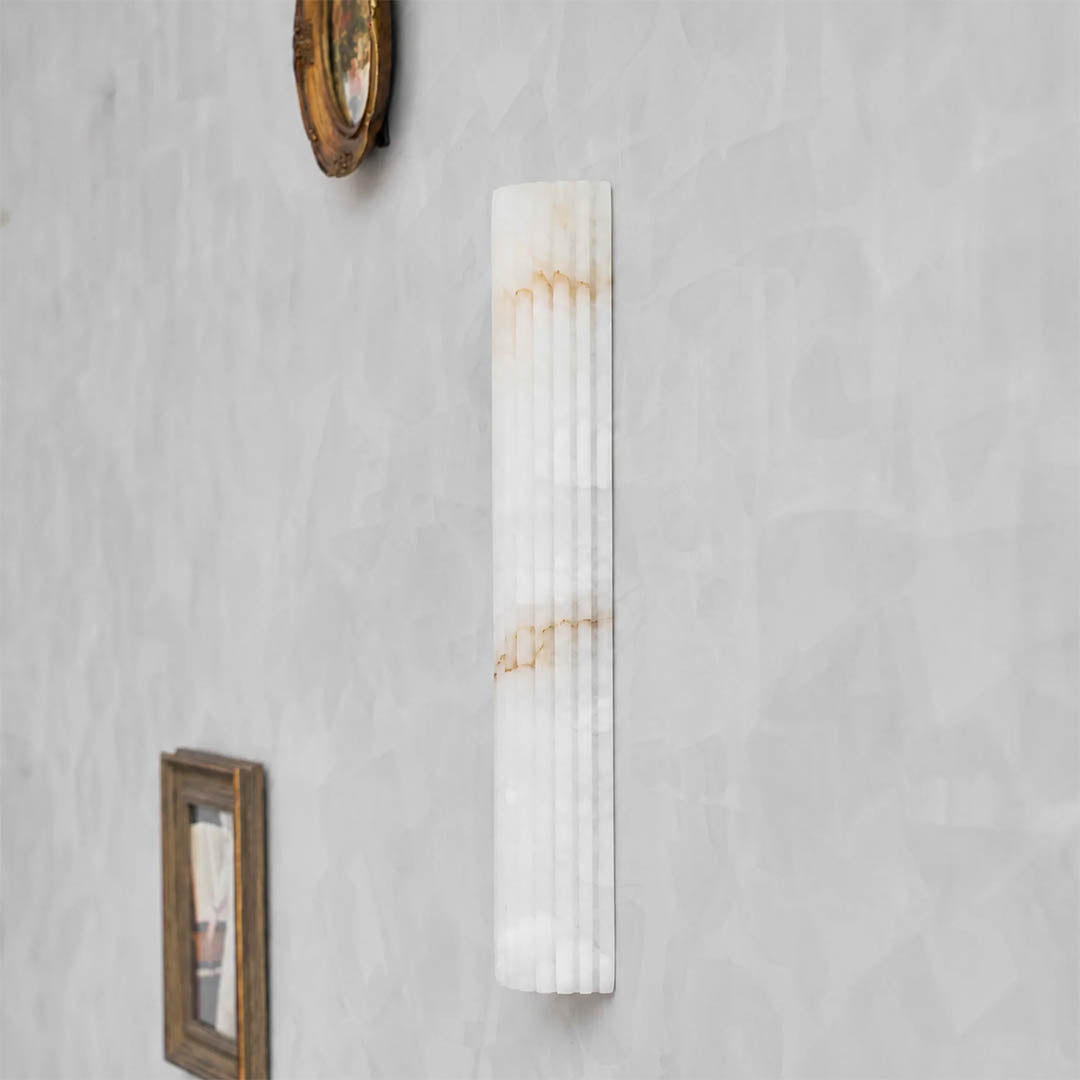 Costa ribbed alabaster wall light large tall natural stone ribbed sconce white statement white background front view