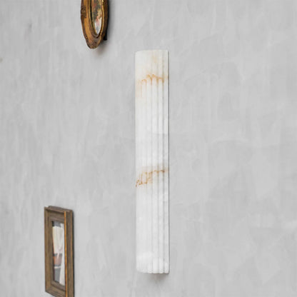 Costa ribbed alabaster wall light large tall natural stone ribbed sconce white statement white background front view