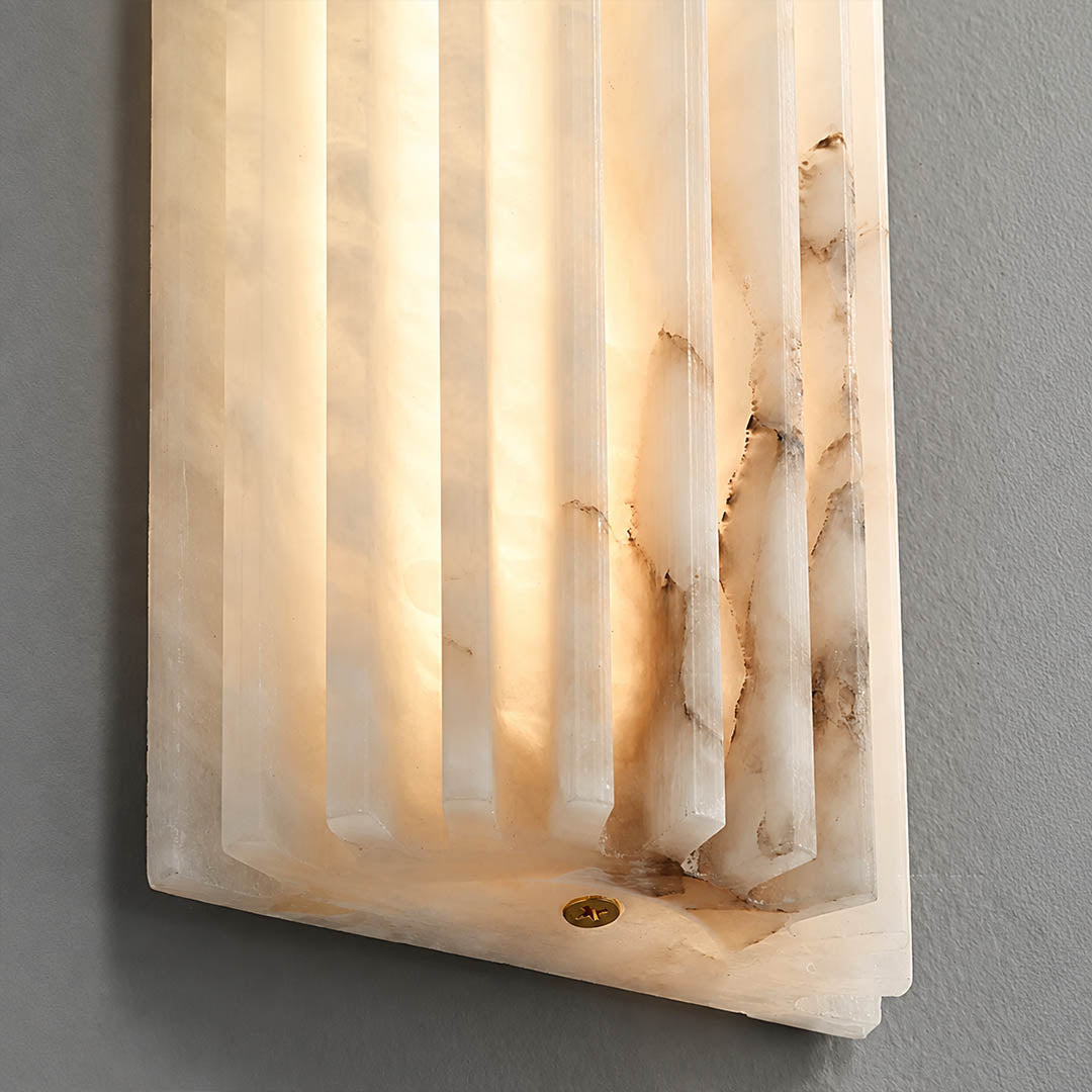 Costa ribbed alabaster wall light vertical ribbed fluted texture stone depth detail close up sculptural organic