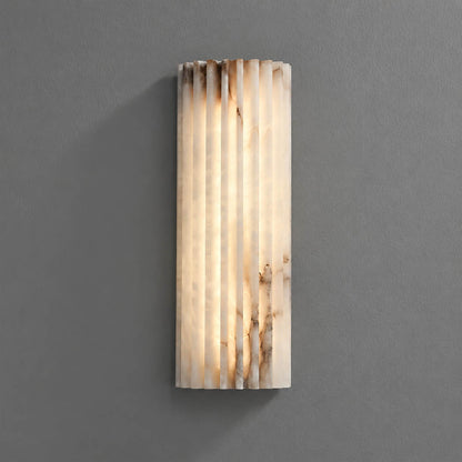 Costa ribbed alabaster wall light medium natural stone ribbed sconce white organic modern white background front view