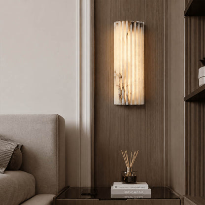 Costa ribbed alabaster wall light bedroom bedside natural stone ribbed white warm glow quiet luxury American home lifestyle interior