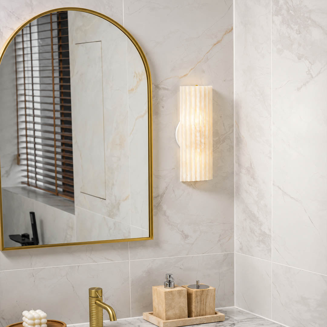 Costa ribbed alabaster wall light mirror vanity vertical natural stone ribbed white warm glow American home lifestyle interior styled