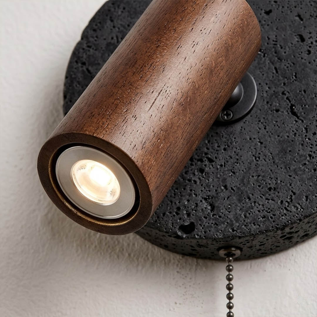 Cove wall sconce walnut wood cylindrical housing metal pendant chain detail close up