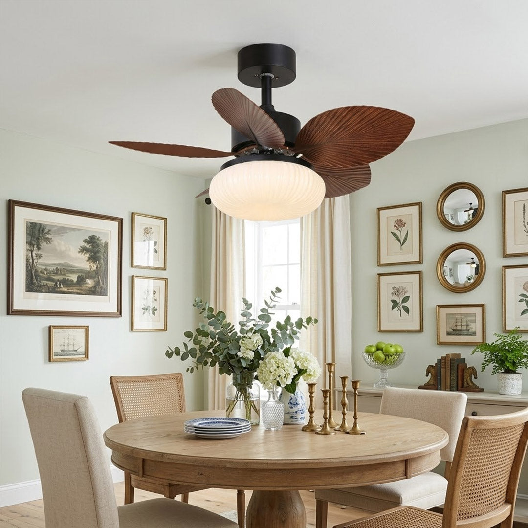 Crème French ceiling fan with light above dining table warm cream ivory finish elegant interior