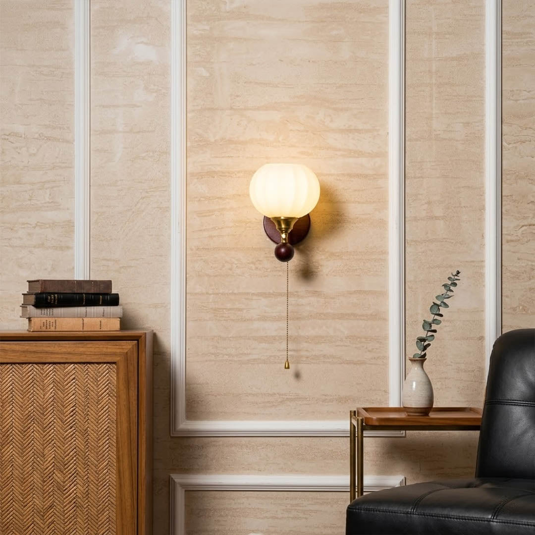 Crescent wall lamp pair beside bed bedroom warm frosted glass glow wood interior