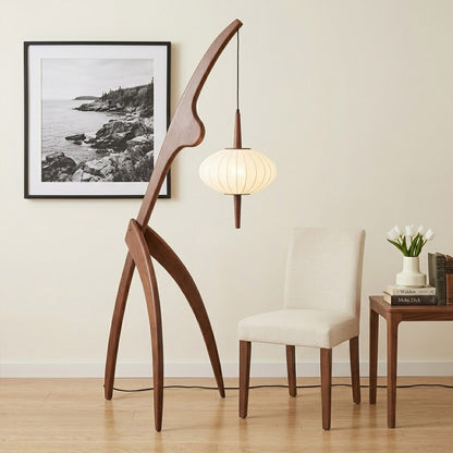 Cygnus natural wood floor lamp Japandi living room next to reading armchair silk warm glow Scandinavian minimalist interior