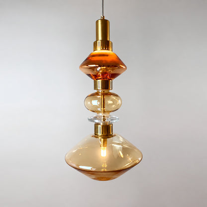 Close-up of the sculptural glass shade on the Danza pendant light