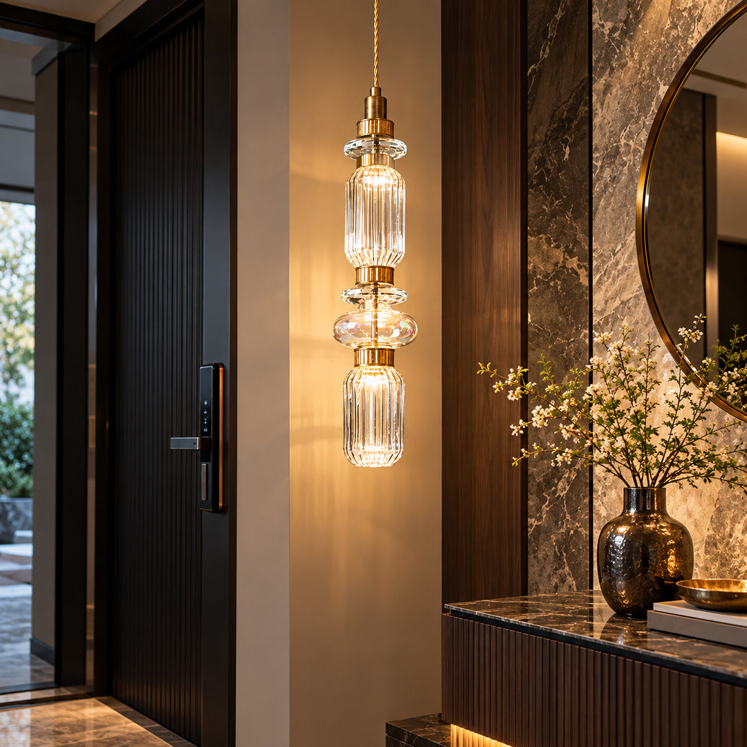 Danza glass pendant cluster welcoming guests in an entryway