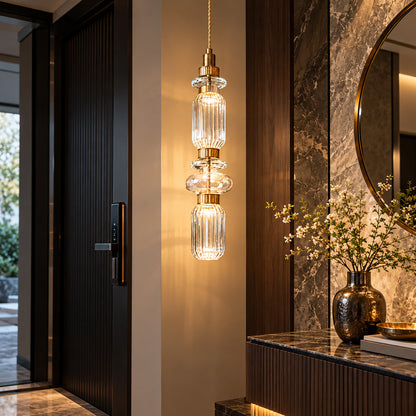 Danza glass pendant cluster welcoming guests in an entryway
