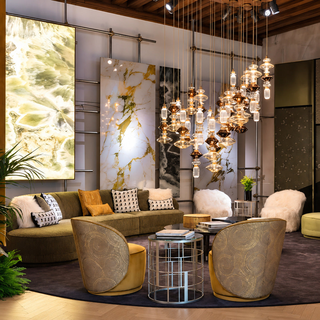 Six-head Danza glass pendant cluster as a focal point in a hotel lobby