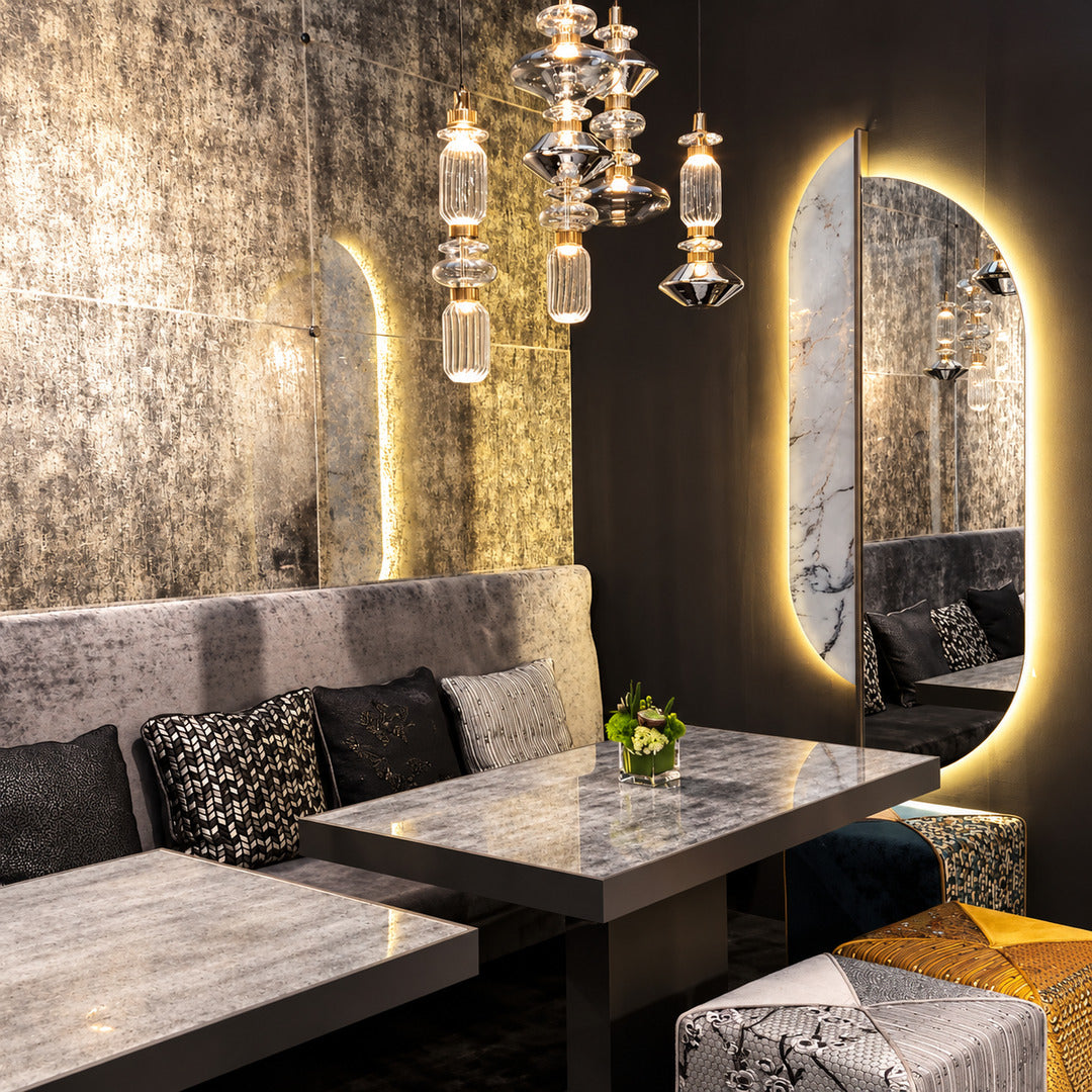 Danza glass pendant lights over tables in an upscale restaurant
