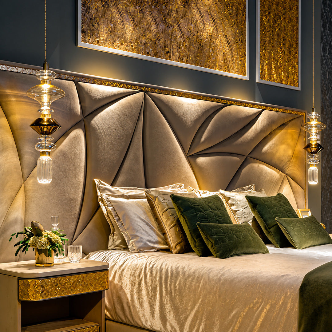 Slim Danza glass pendant light hanging beside a bed as a bedside light