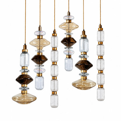 Six-head Danza glass pendant cluster on a long canopy over a kitchen island