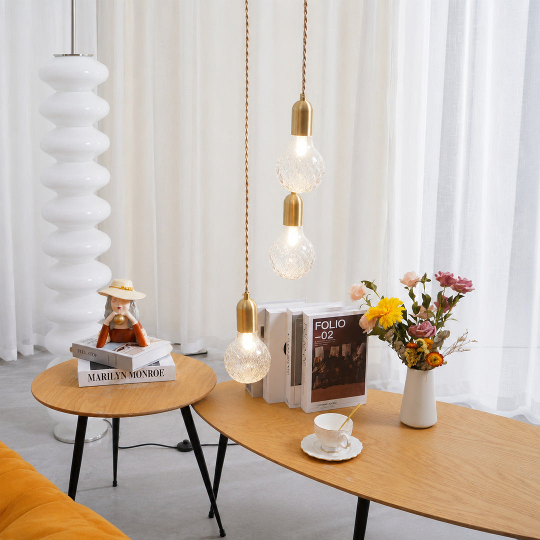Single Diamante cut-glass pendant light over a breakfast bar counter