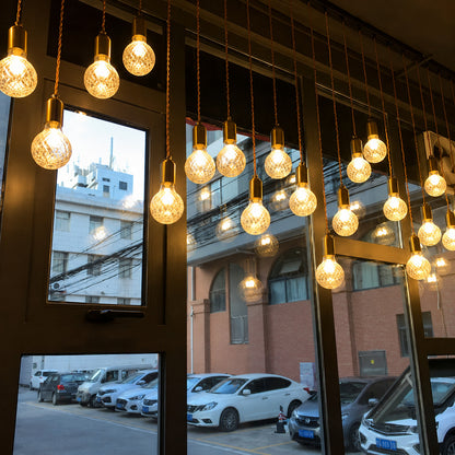 Diamante cut-glass pendant light highlighting a high-end retail boutique display