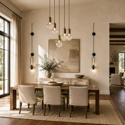 Diamante glass pendant light casting sparkling warm light over a contemporary dining table