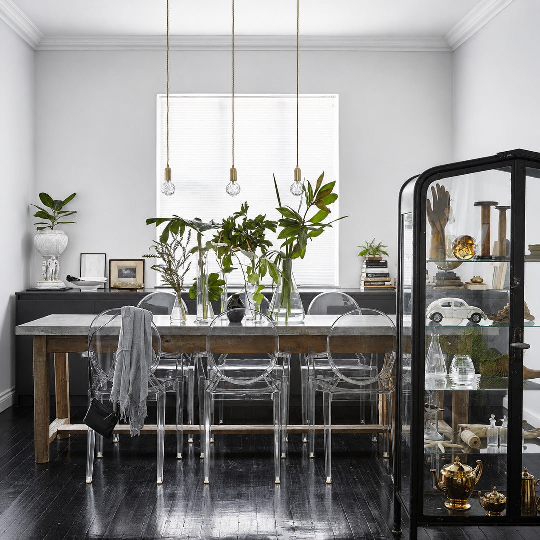 Row of Diamante cut-glass pendant lights suspended over a modern kitchen island