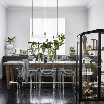 Row of Diamante cut-glass pendant lights suspended over a modern kitchen island