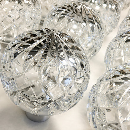 Close-up of the faceted diamond-cut glass bulb shade on the Diamante pendant light catching the light