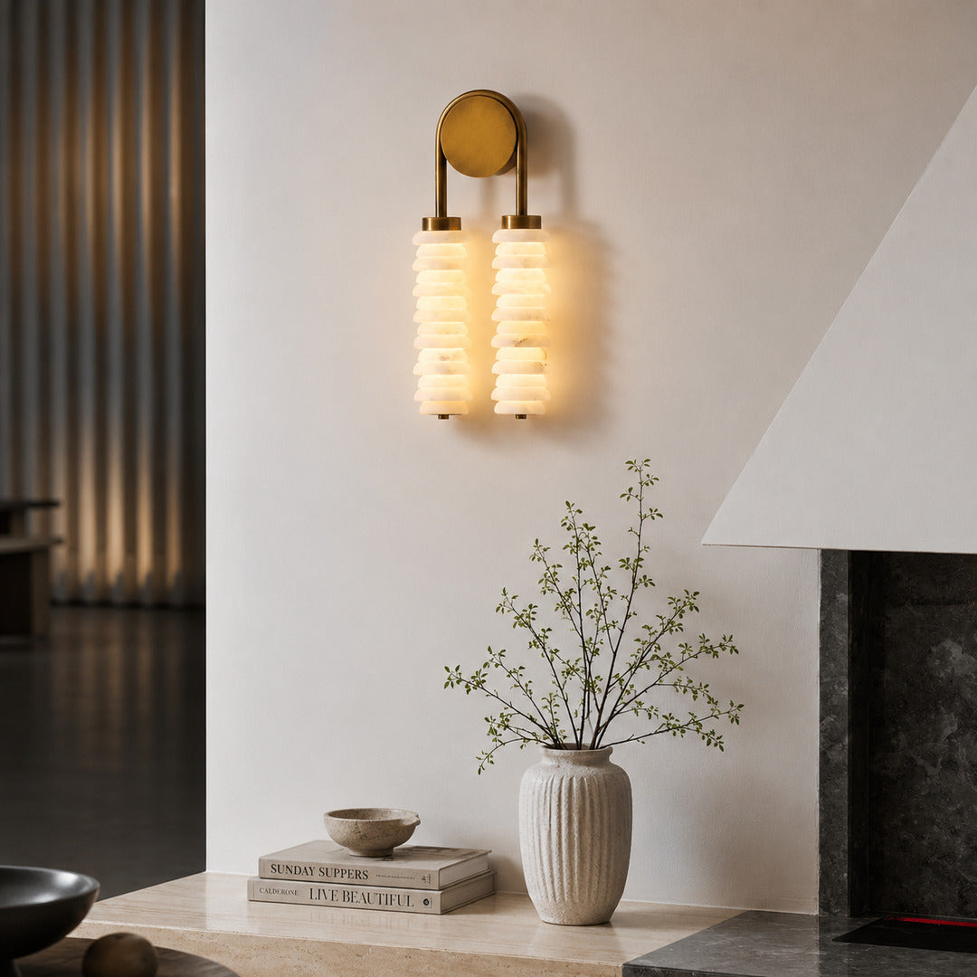 Duetto alabaster wall sconce as a warm sculptural accent on a modern living room feature wall