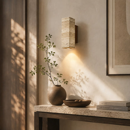 Duplo travertine wall sconce entryway foyer warm glow travertine stone up down American home lifestyle interior styled