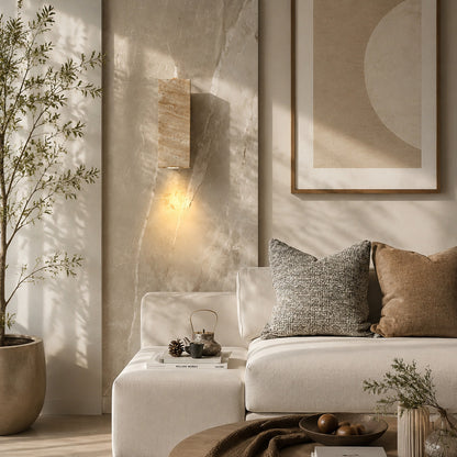 Duplo travertine wall sconce living room wall up down warm glow travertine stone beam American home lifestyle interior styled