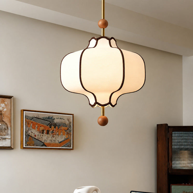 Dynasty lantern pendant light as a warm fabric centerpiece in a living room