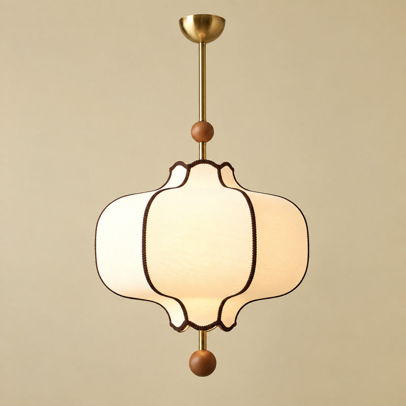 Medium 15.7-inch Dynasty lantern pendant light centered above a four-seat dining table