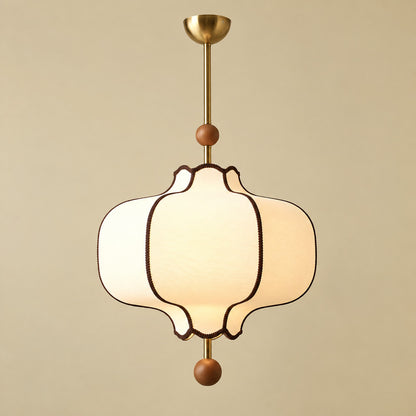 Medium 15.7-inch Dynasty lantern pendant light centered above a four-seat dining table