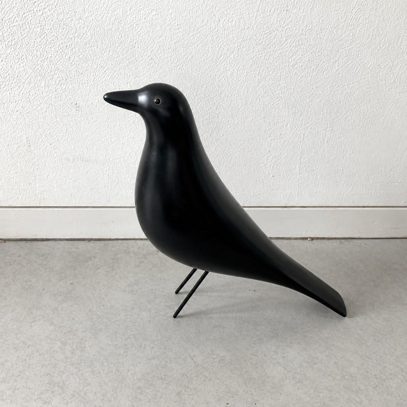 Detail of the smooth matte finish on the Eames House Bird decorative sculpture
