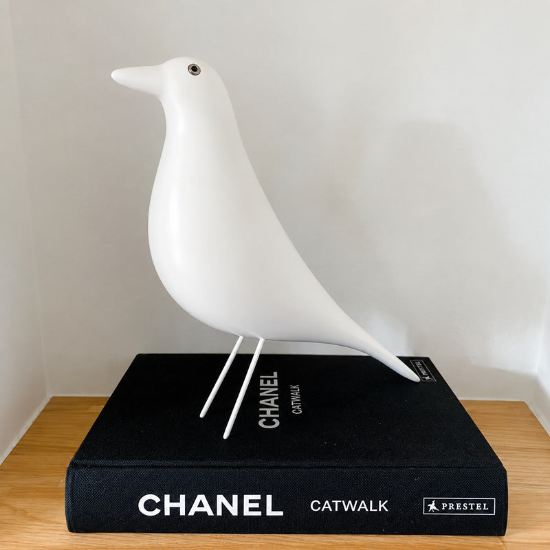 Eames House Bird sculpture brightening a home office desk as a designer ornament