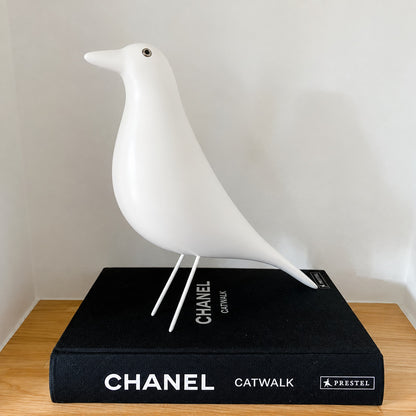 Eames House Bird sculpture brightening a home office desk as a designer ornament