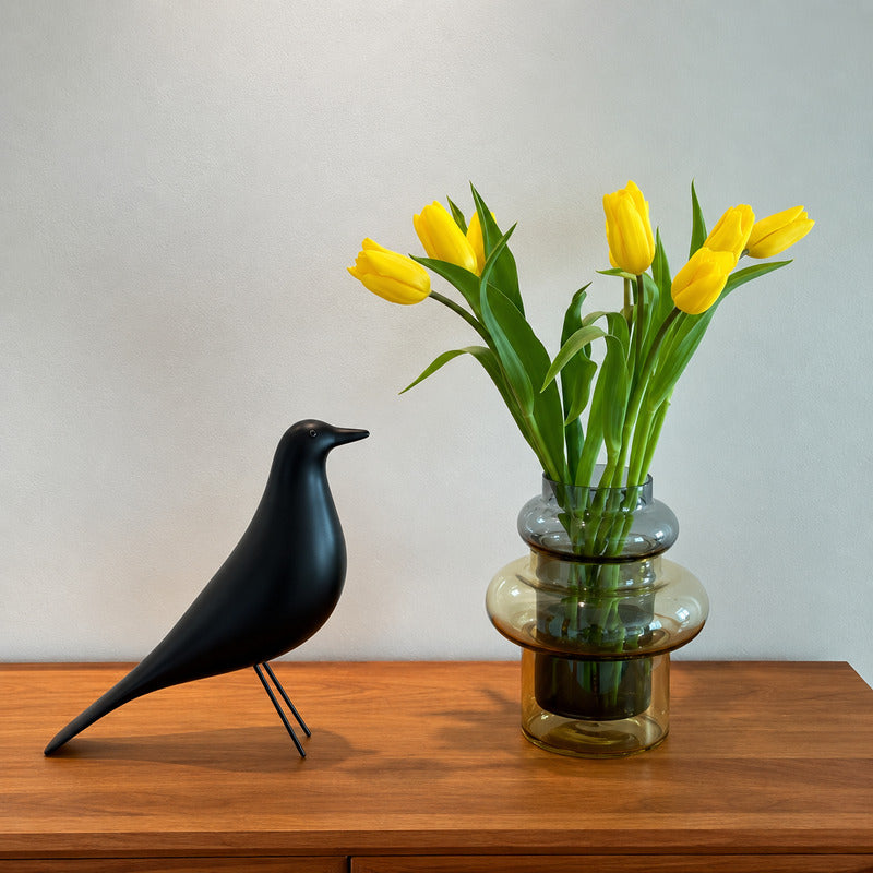 Eames House Bird sculpture brightening a home office desk as a designer ornament