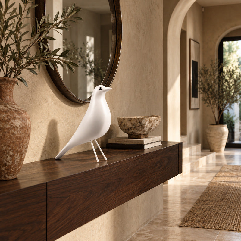 Eames House Bird sculpture welcoming guests as a decorative accent on an entryway console