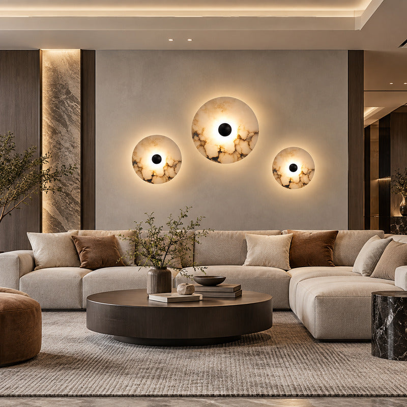 Eclisse alabaster wall sconce as a warm sculptural accent on a modern living room wall