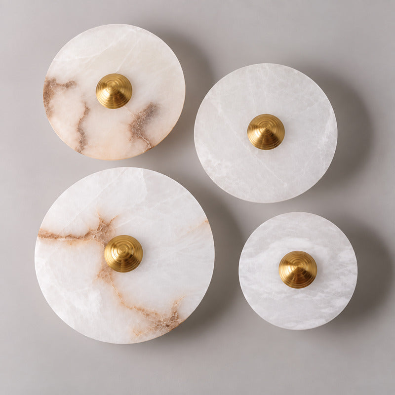 Size chart of the Eclisse alabaster wall sconce showing the 7.9 9.8 11.8 and 13.8 inch diameters