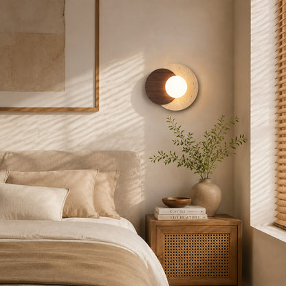 Eclisse travertine wall sconce bedroom bedside warm glow white glass globe travertine stone wood minimalist American home lifestyle interior styled