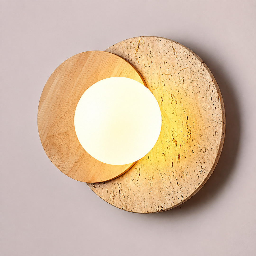 Eclisse travertine wall sconce white glass globe yellow travertine stone wood base minimalist sculptural white background