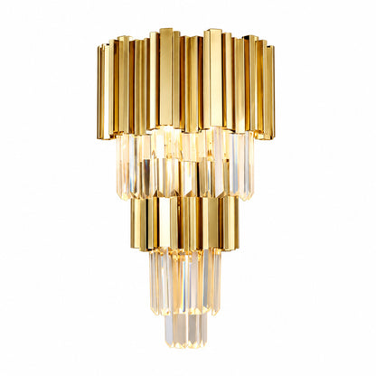 Empire crystal wall sconce with tiered precision-cut crystals on a gold frame glowing warm on a wall
