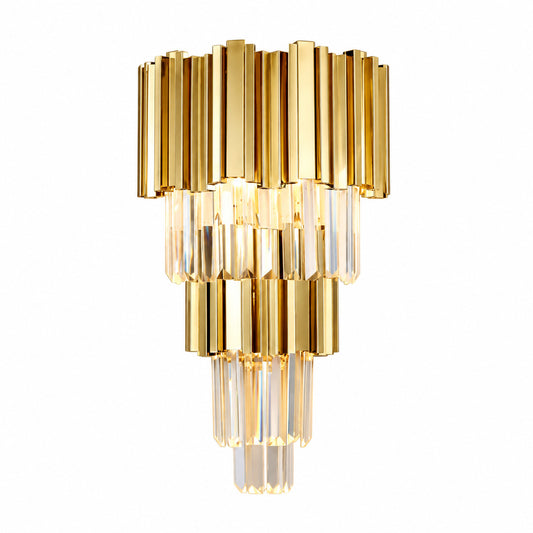 Empire crystal wall sconce with tiered precision-cut crystals on a gold frame glowing warm on a wall