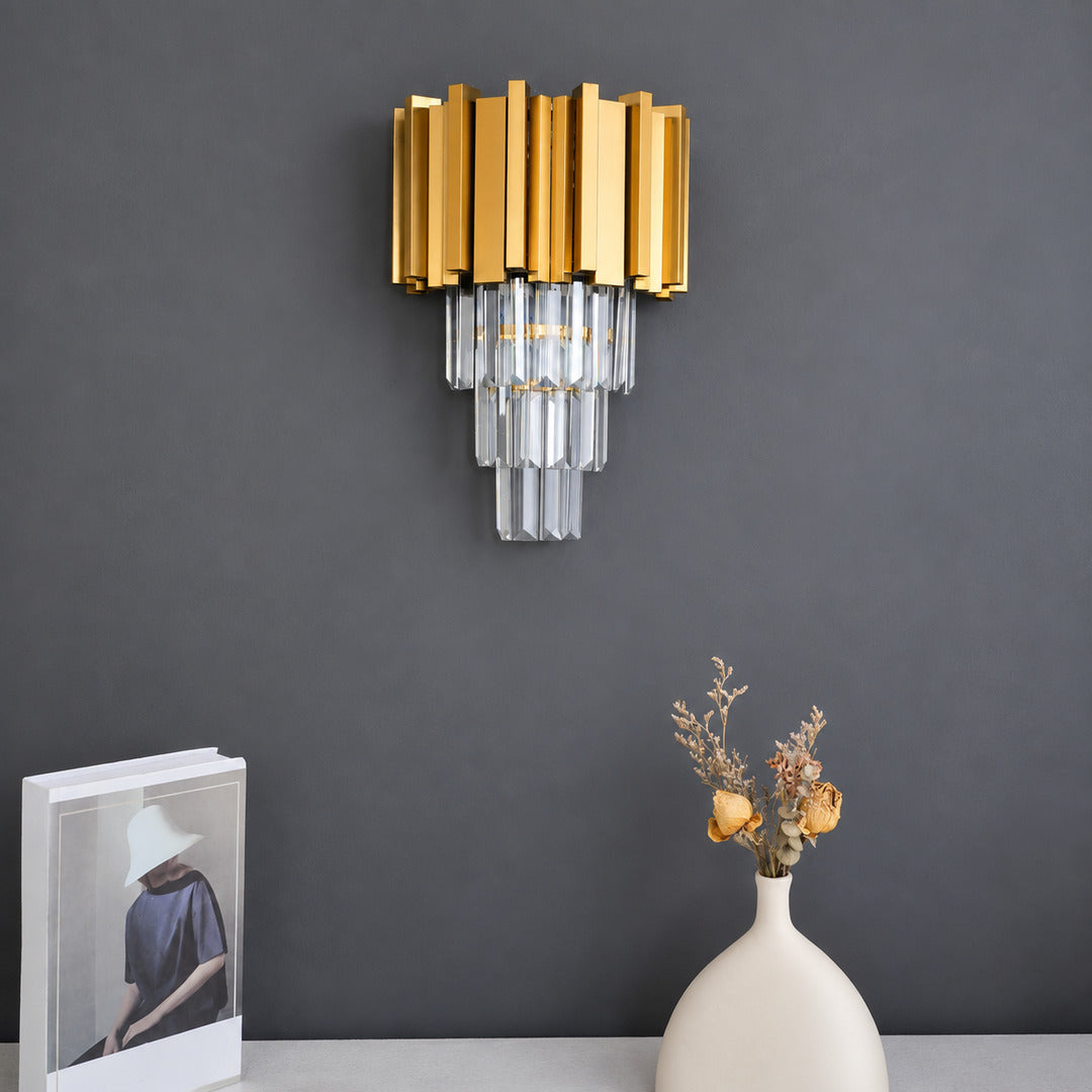 Close-up of the tiered stepped crystal prisms on the Empire crystal wall sconce