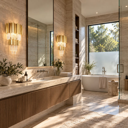 Pair of Empire crystal wall sconces flanking a vanity mirror in a dry dressing area