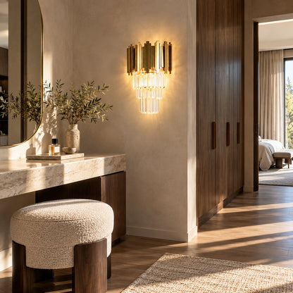Pair of Empire crystal wall sconces flanking a vanity mirror in a dry dressing area