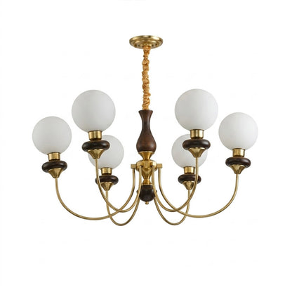 Estelle wood glass chandelier above dining table warm Edison filament glow French farmhouse interior